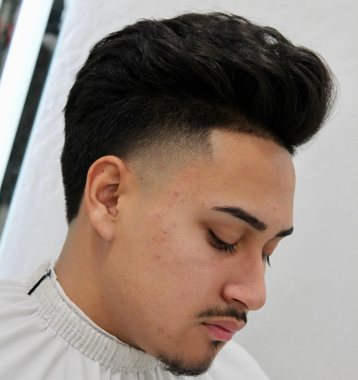 KEEP - 👑🦁KEEP 👑🦁 Mid Fade and High Brush Up For a beach-ready look,  this high volume brush up will deliver. The hair is combed into a neat  wave, and the mid