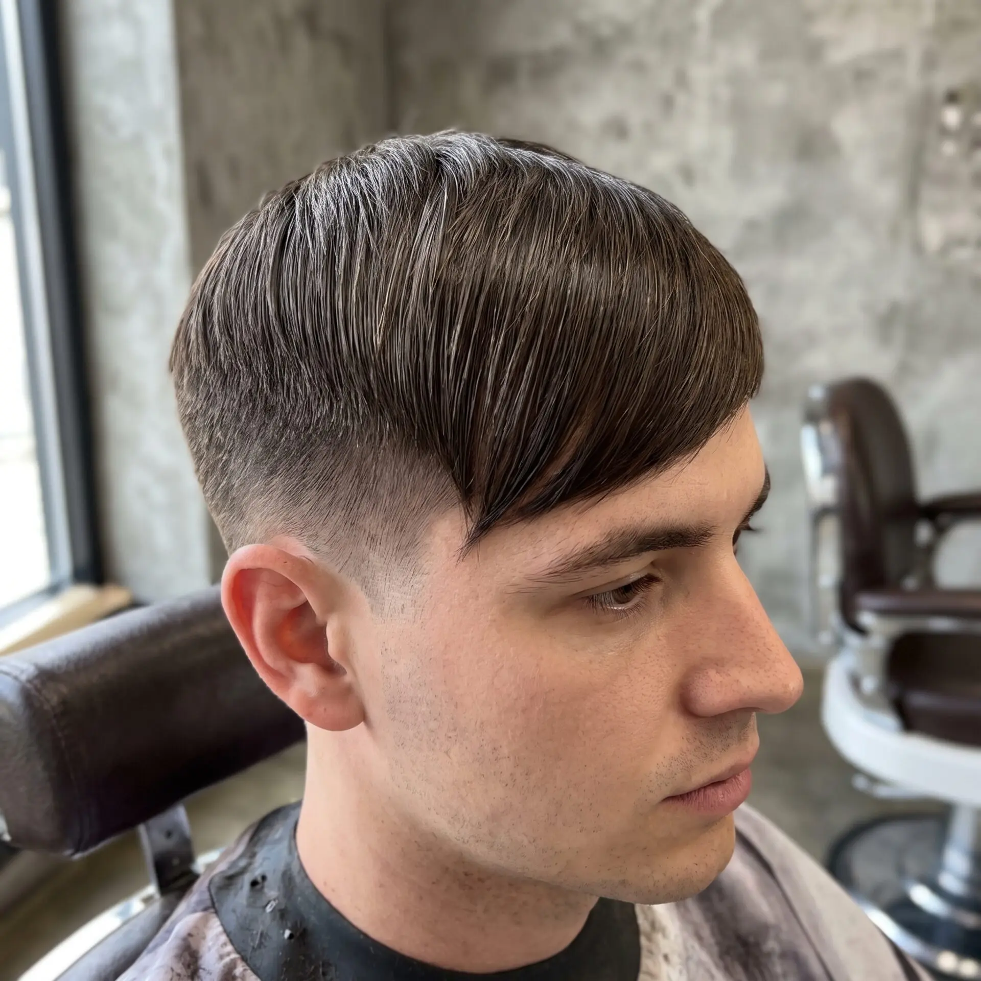 Side-swept fringe hairstyle for rectangle face men